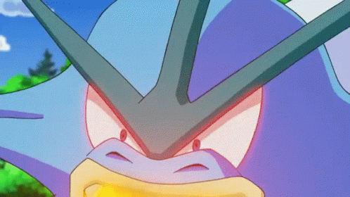 A Close Up Of A Purple And Blue Cartoon Character With A Red Eye GIF
