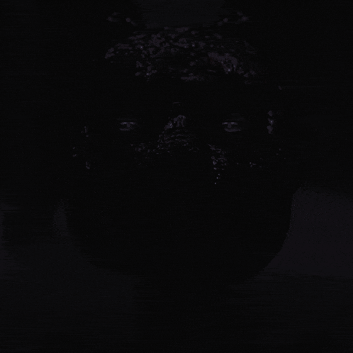 A Close Up Of A Rabbit 'S Face With A Purple Background GIF