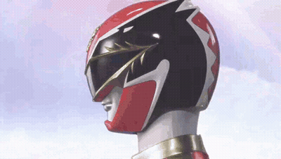 A Close Up Of A Red And Black Power Ranger 'S Helmet . GIF