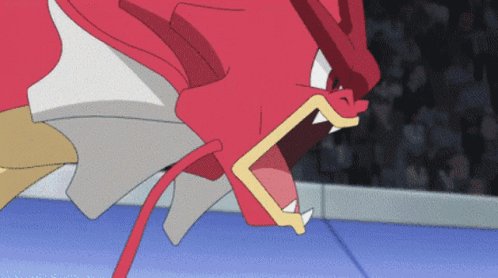 A Close Up Of A Red And White Cartoon Character GIF