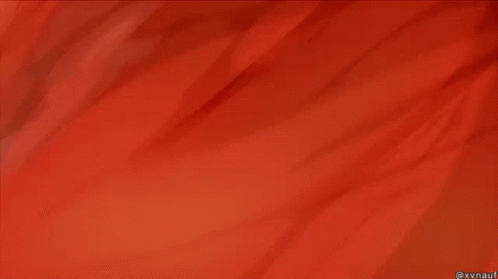 A Close Up Of A Red And White Striped Fabric GIF
