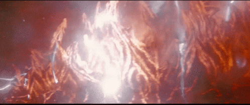 A Close Up Of A Red Background With A Glowing Light In The Middle GIF