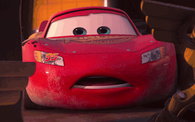 A Close Up Of A Red Car With The Number 95 On The Front GIF