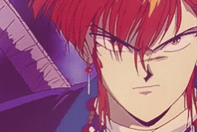 A Close Up Of A Red Haired Anime Character With A Serious Look On His Face GIF