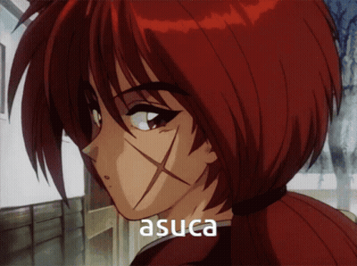 A Close Up Of A Red Haired Anime Character With The Name Asuca Written On The Bottom GIF