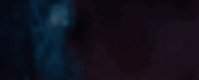 A Close Up Of A Red Light Beam On A Dark Background . GIF