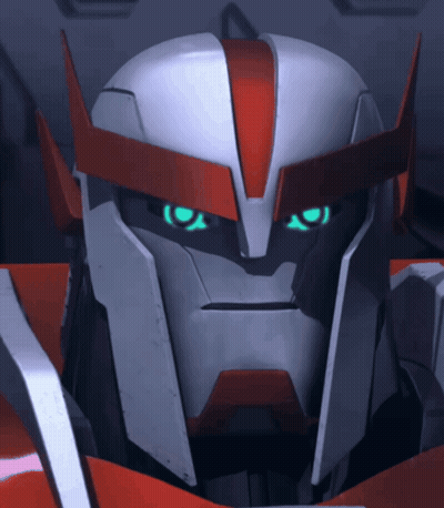 A Close Up Of A Robot 'S Face With Blue Eyes GIF