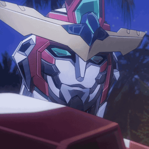 A Close Up Of A Robot 'S Face With Blue Eyes GIF