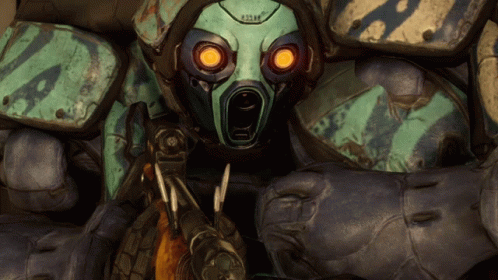A Close Up Of A Robot With A Mask That Says ' A2m ' On It GIF