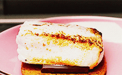 A Close Up Of A S'mores On A Plate GIF
