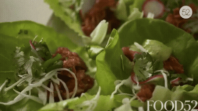A Close Up Of A Salad With The Words Food52 On It GIF