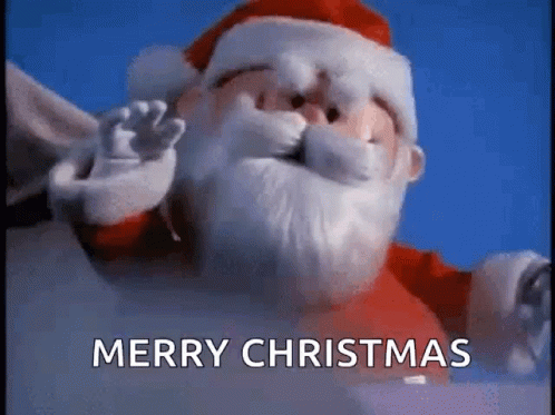 A Close Up Of A Santa Claus Statue With The Words Merry Christmas Written In The Background . GIF