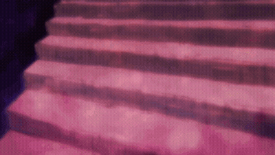 A Close Up Of A Set Of Pink Stairs With A Purple Background . GIF
