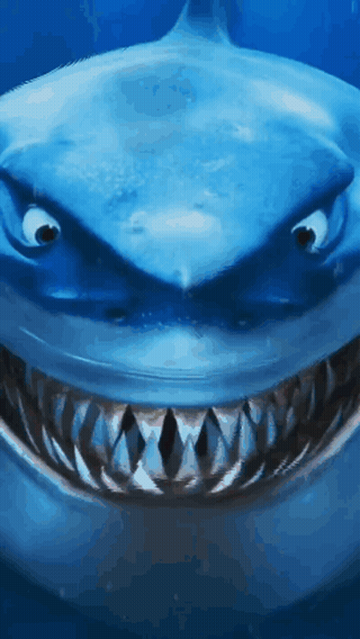 A Close Up Of A Shark 'S Mouth And Teeth GIF