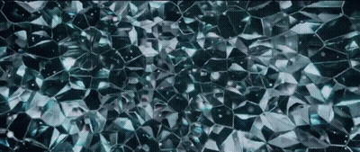 A Close Up Of A Shiny Blue Glass Texture GIF