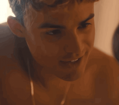 A Close Up Of A Shirtless Man 'S Face Smiling GIF