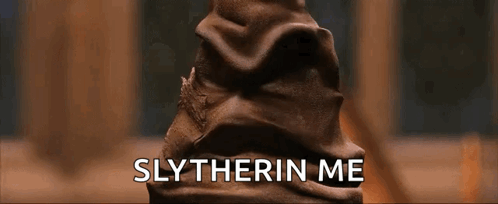 A Close Up Of A Slytherin Hat With The Words Slytherin Me Written Below It GIF