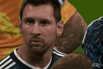 A Close Up Of A Soccer Player 'S Face On A Green Field GIF