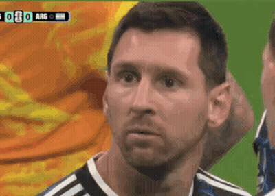 A Close Up Of A Soccer Player 'S Face With A Scoreboard Behind Him That Says Arg GIF