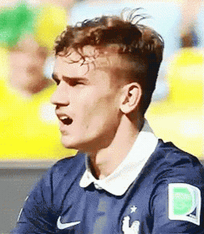 A Close Up Of A Soccer Player Wearing A Blue Jersey With The Letter D On It GIF
