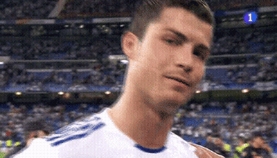 A Close Up Of A Soccer Player Wearing A White Shirt With Blue Stripes . GIF