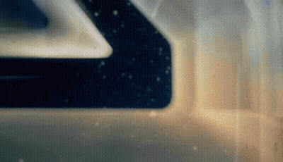 A Close Up Of A Space Ship 'S Window With A Reflection Of The Stars In It . GIF