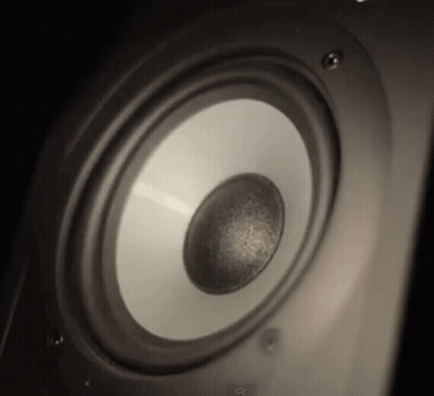A Close Up Of A Speaker With An Arrow Pointing Up GIF