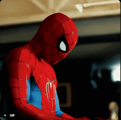 a close up of a spider man costume with a gif below it