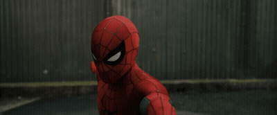 A Close Up Of A Spider Man In A Red Suit GIF