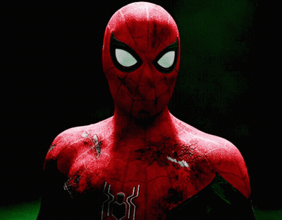 A Close Up Of A Spider Man 'S Face With A Black Background GIF