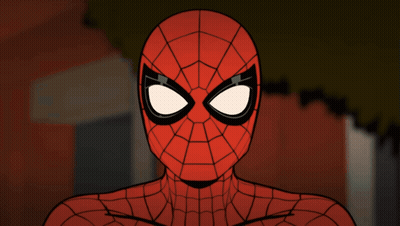 A Close Up Of A Spider Man 'S Face With A Brick Wall In The Background GIF