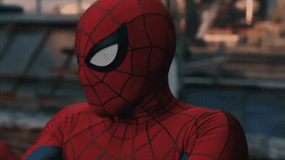 A Close Up Of A Spider Man 'S Face With His Eyes Closed GIF