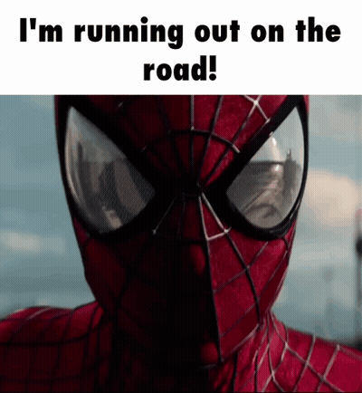 A Close Up Of A Spider Man With The Words " I 'M Running Out On The Road " Above Him GIF