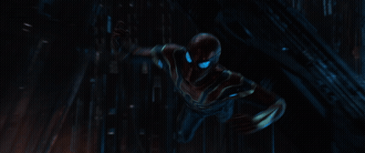 A Close Up Of A Spiderman With Blue Eyes Holding A Spider Web GIF
