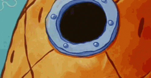 A Close Up Of A Spongebob Pineapple With A Hole In Its Eye . GIF