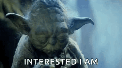 A Close Up Of A Statue Of Yoda With The Words `` Interested I Am '' Written On The Bottom . GIF