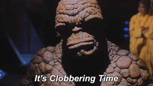 A Close Up Of A Statue With The Words It 'S Clobbering Time On It GIF
