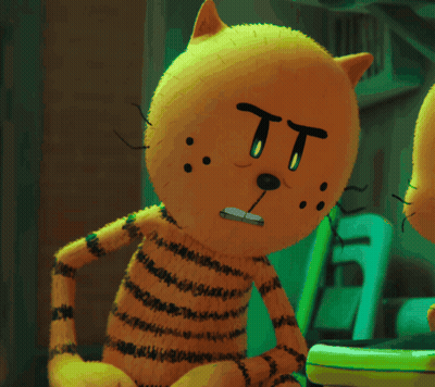 A Close Up Of A Stuffed Animal With A Surprised Look On His Face GIF