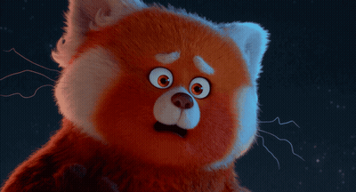 A Close Up Of A Stuffed Animal With A Surprised Look On His Face GIF
