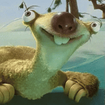 A Close Up Of A Stuffed Animal With Big Eyes And A Smile On Its Face GIF