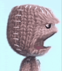 A Close Up Of A Stuffed Animal With Its Mouth Open And Stitches On It . GIF