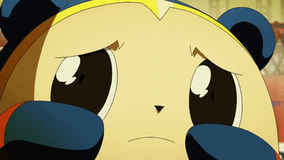A Close Up Of A Teddy Bear With A Sad Look On Its Face GIF