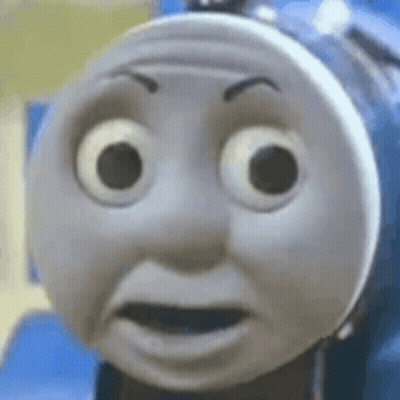 A Close Up Of A Thomas The Tank Engine 'S Face With A Surprised Look On His Face . GIF