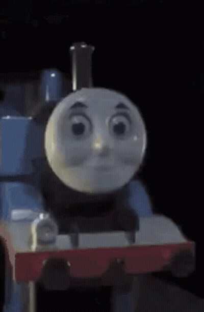 A Close Up Of A Thomas The Tank Engine With A Sad Face . GIF