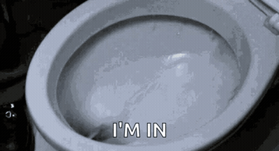 A Close Up Of A Toilet With Water Coming Out Of It And The Words `` I 'M In '' Written On It . GIF