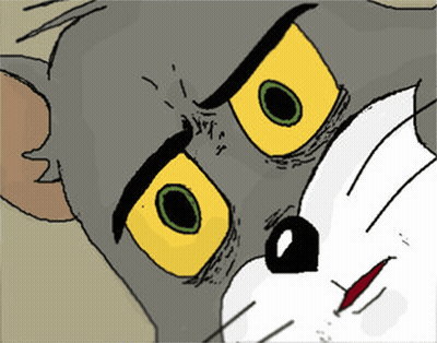 A Close Up Of A Tom And Jerry Cartoon Character With Yellow Eyes GIF