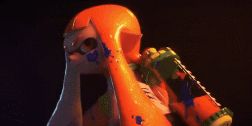 A Close Up Of A Toy Squid With A Surprised Look On Its Face . GIF