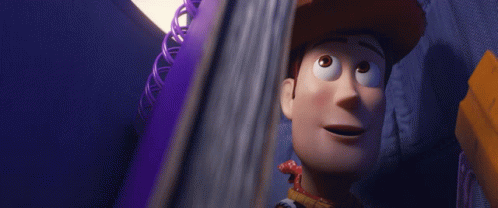 A Close Up Of A Toy Story Character Woody GIF