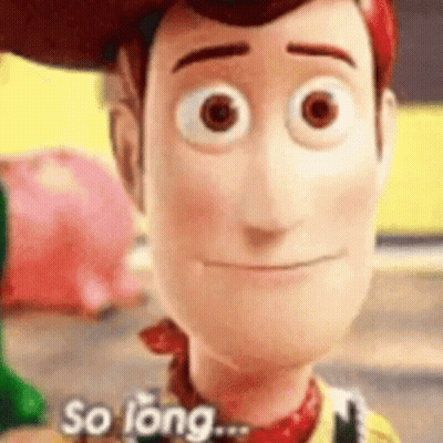 A Close Up Of A Toy Story Woody Doll 'S Face . GIF