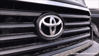 A Close Up Of A Toyota Logo On The Front Of A Vehicle GIF